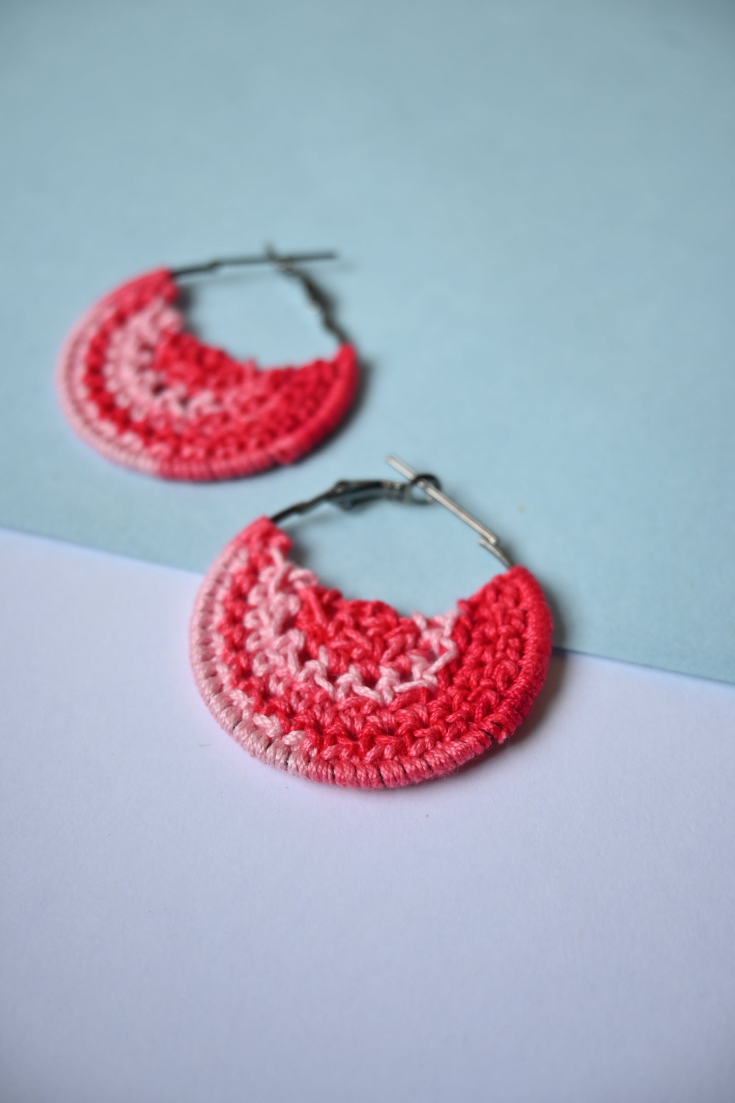 Red tinted small crochet earrings