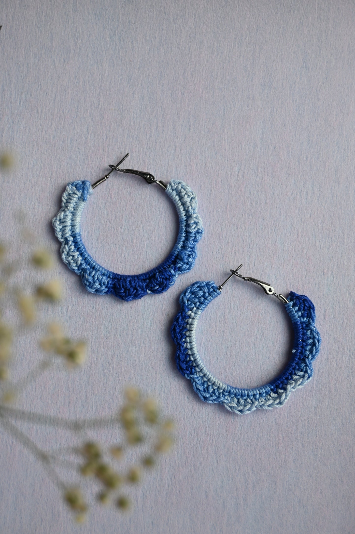 Blue tinted small crochet earrings