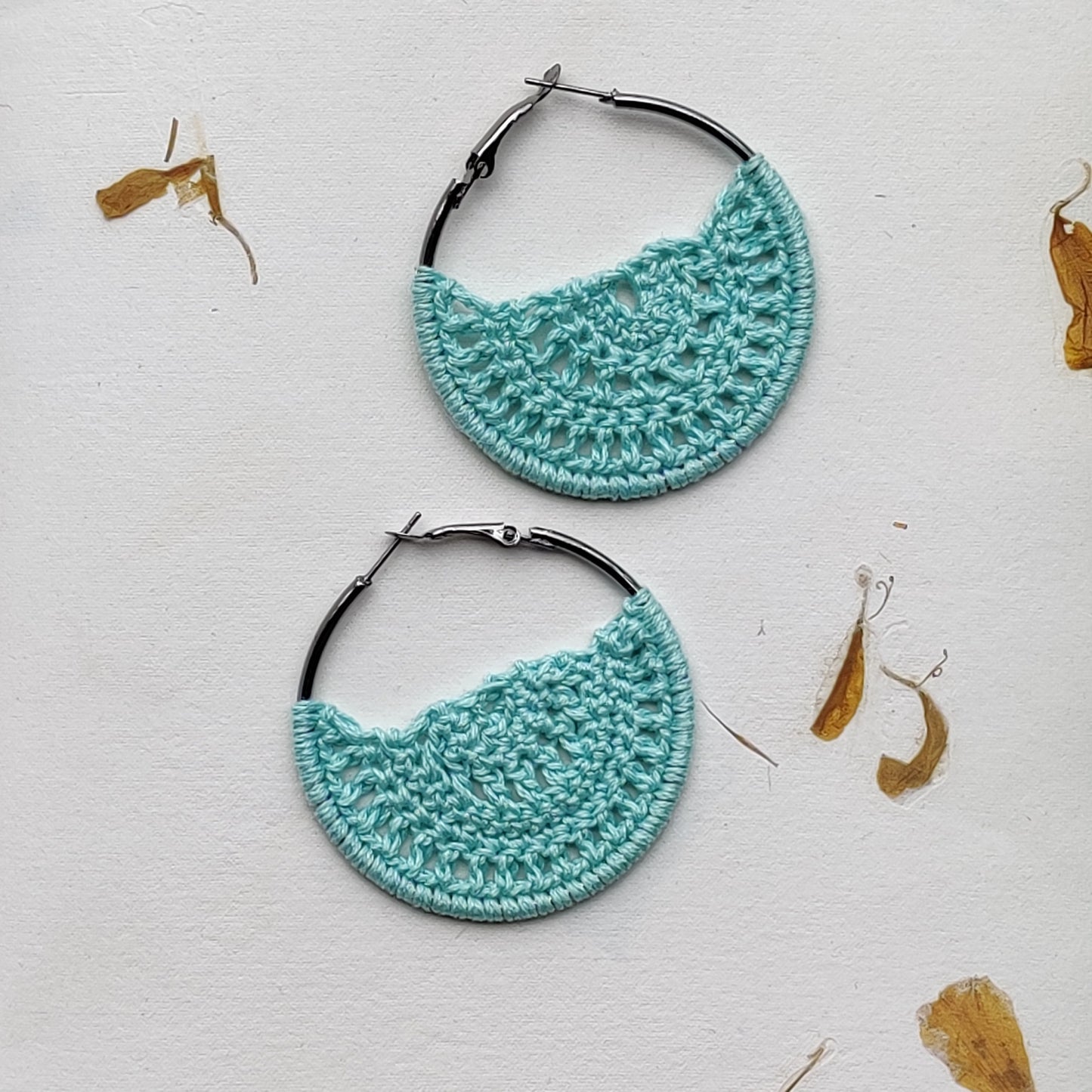 Aqua blue crochet earrings
